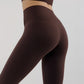 back of woman in brown leggings