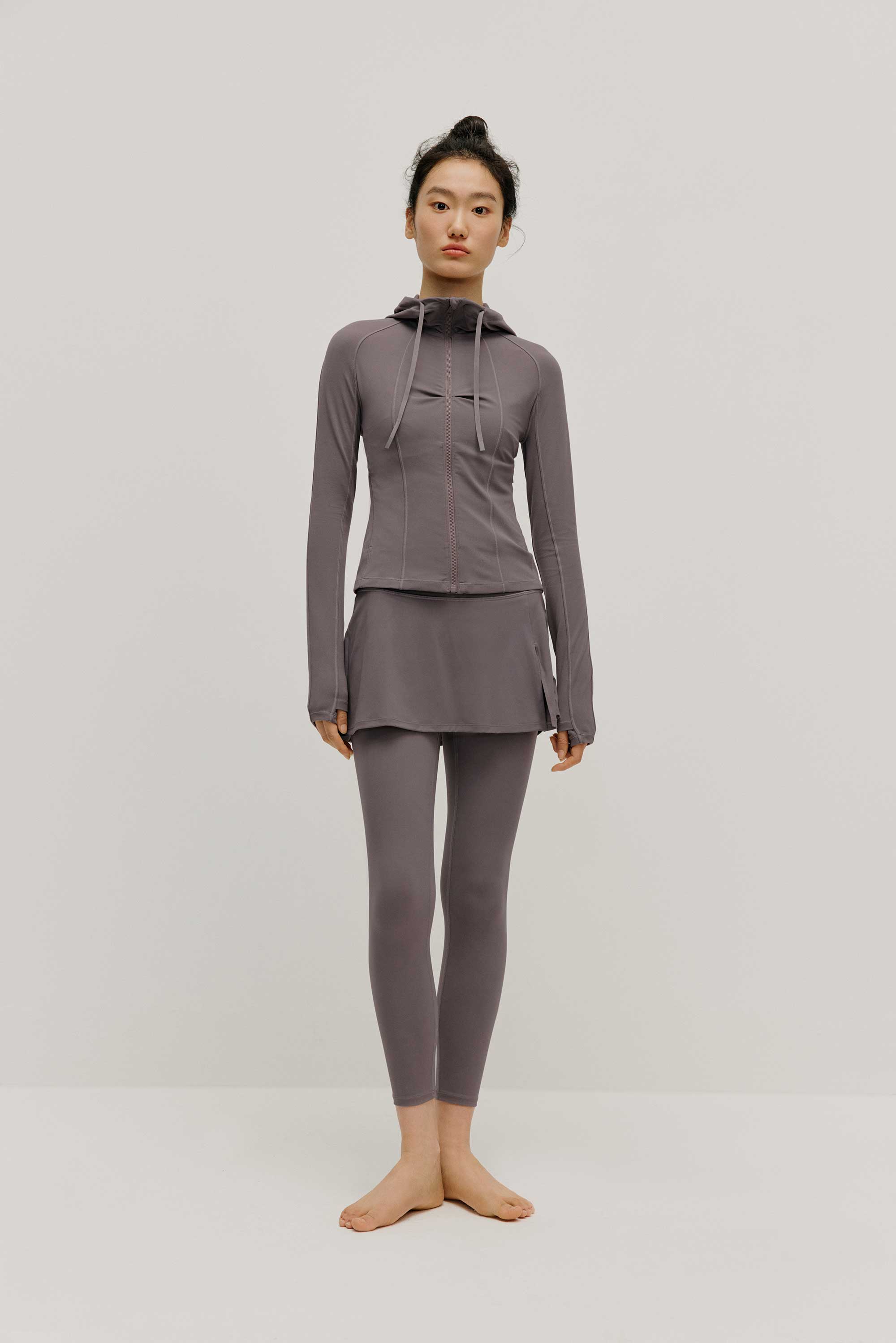 woman in grey hoodie