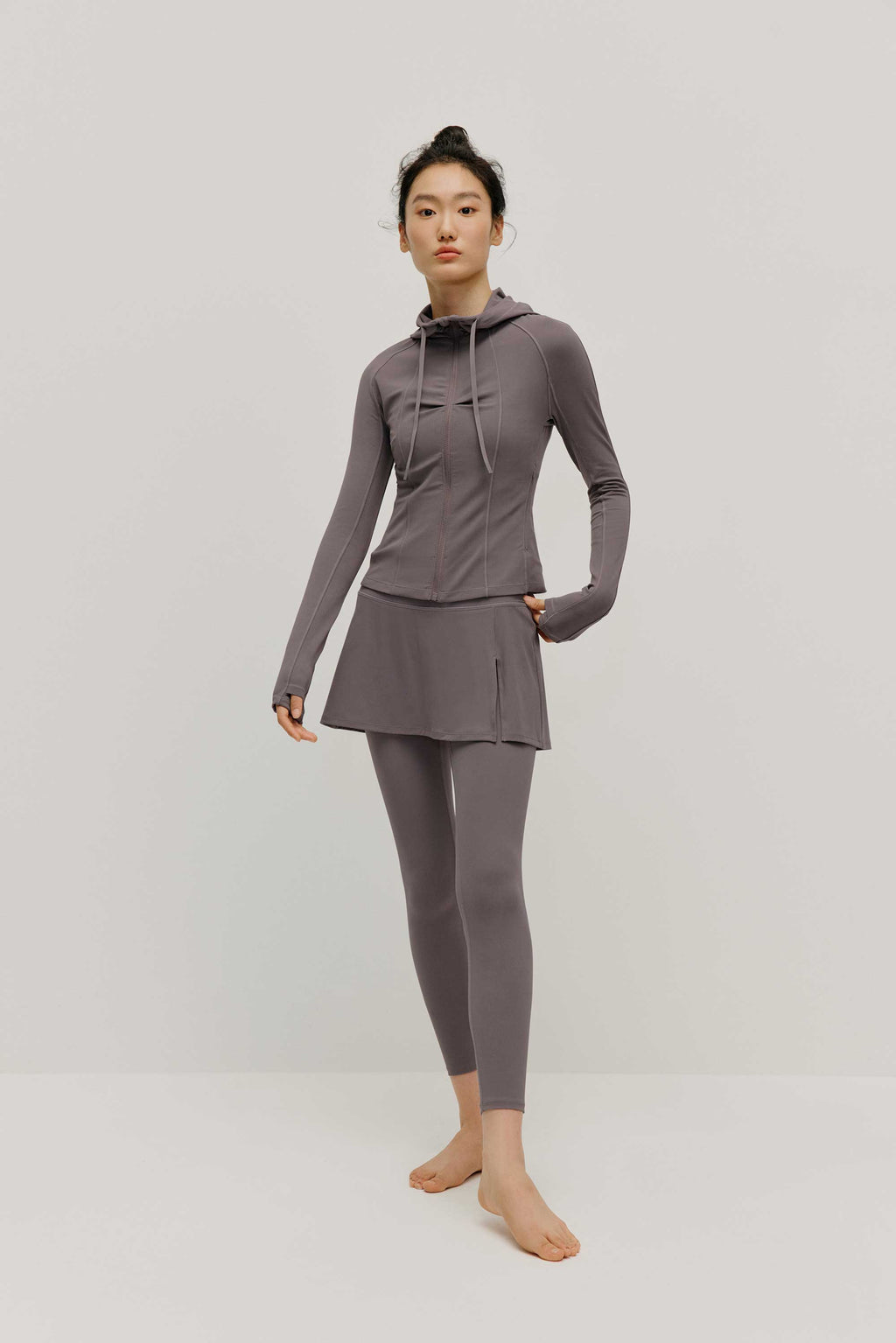 woman in grey hoodie