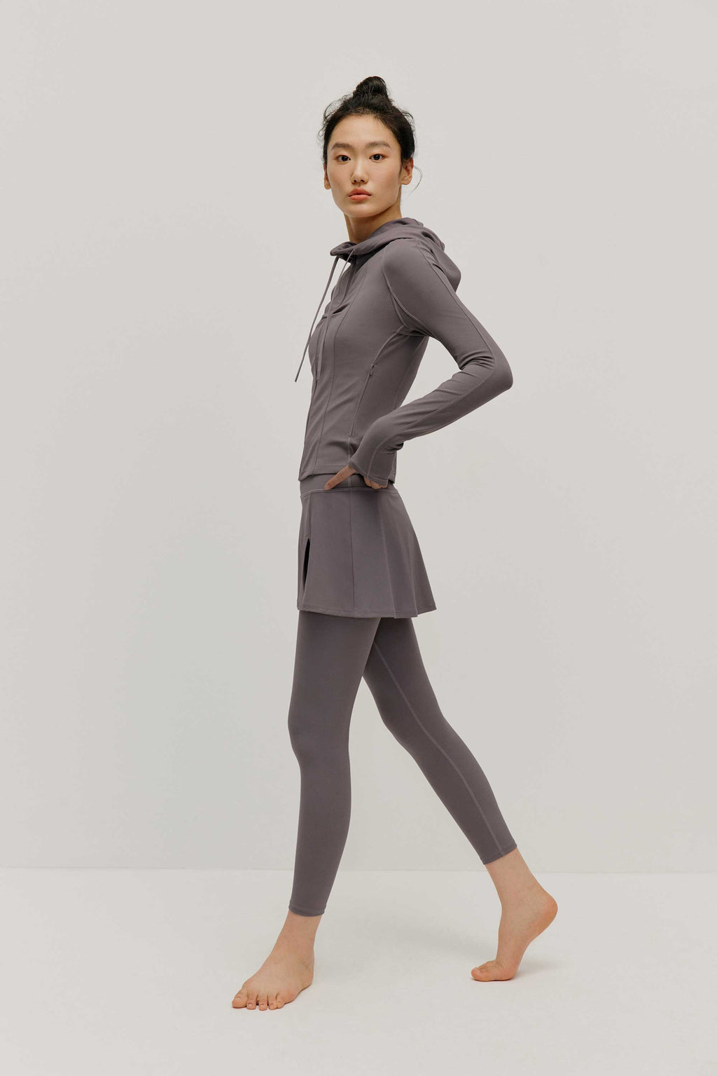 woman in grey hoodie