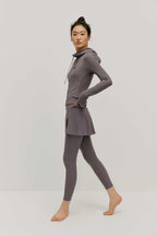woman in grey hoodie