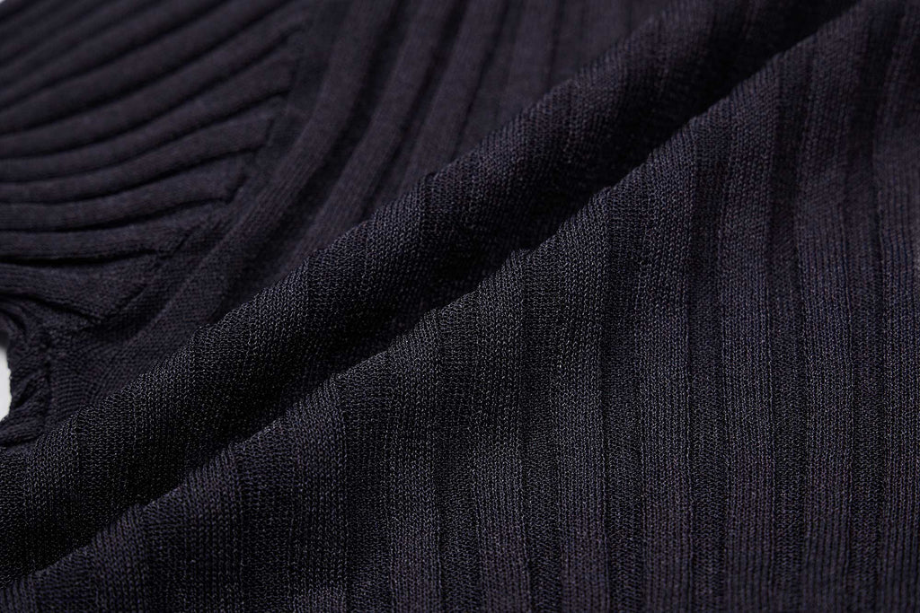 a close up of the ribbed textured knitwear fabric