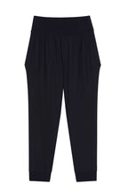 The flat lay image of a pair of black tapered joggers