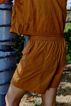 brown shorts