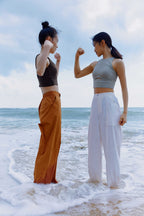 women in blue and brown pants