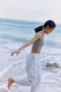 woman in blue pants