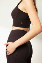 woman in black sports bra