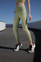 woman in green leggings