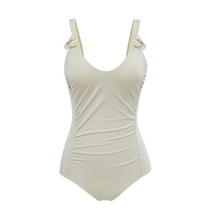 flat lay of light golden swimsuit
