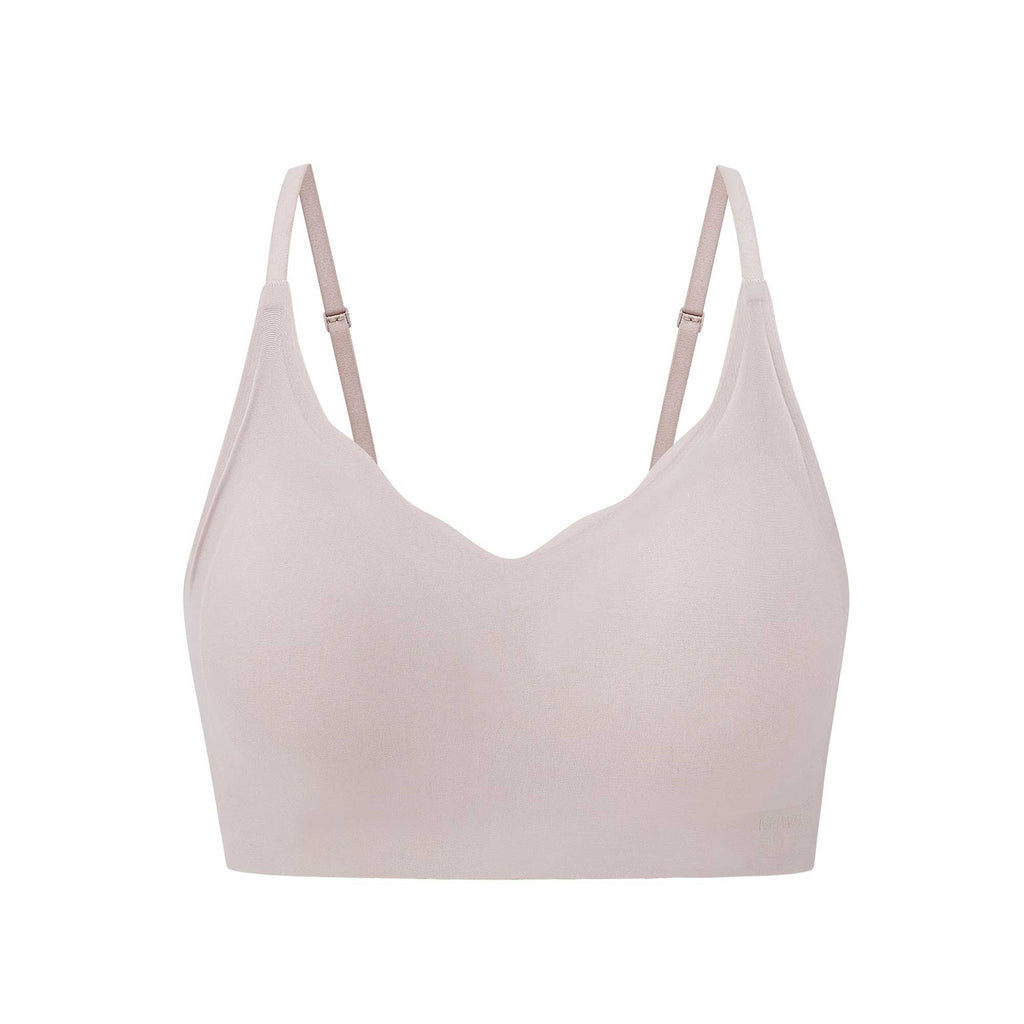 Flat lay of a light pink bra