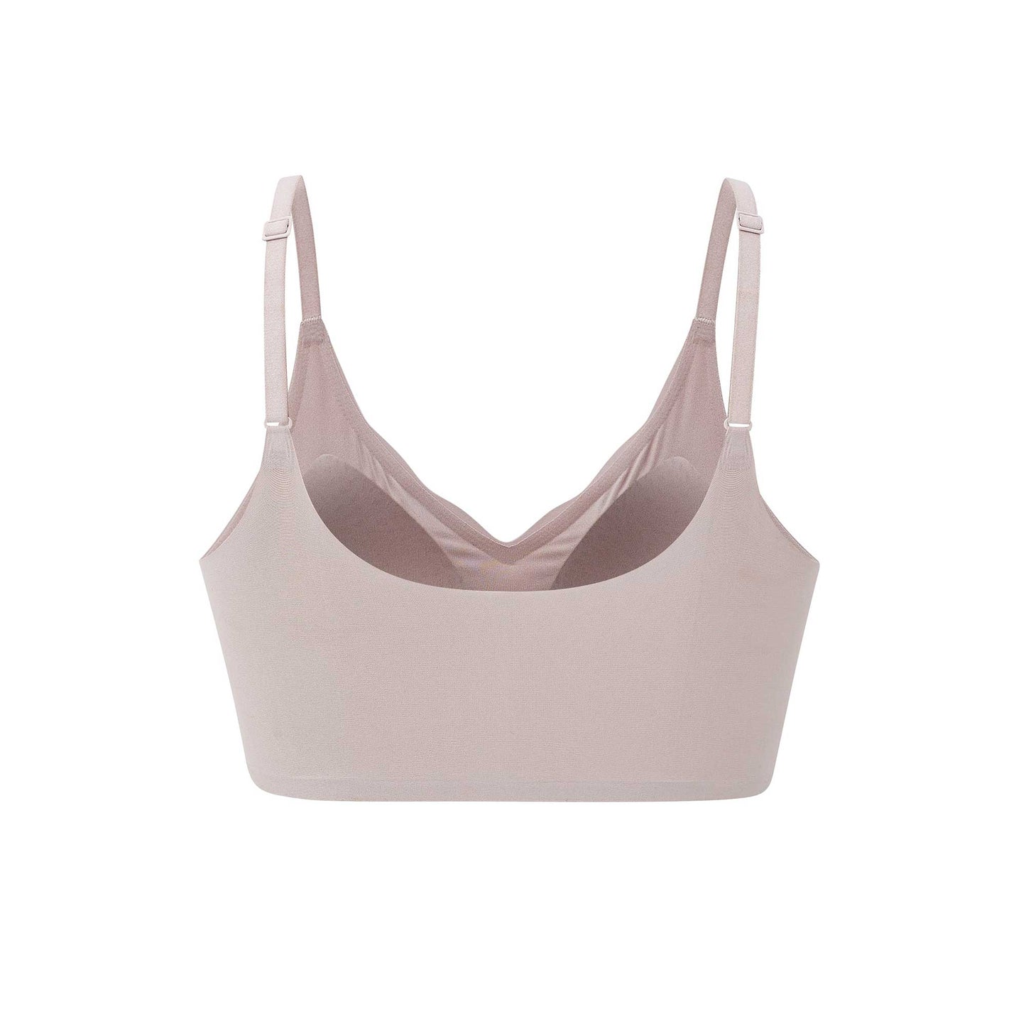 the back of a light pink pull over bra