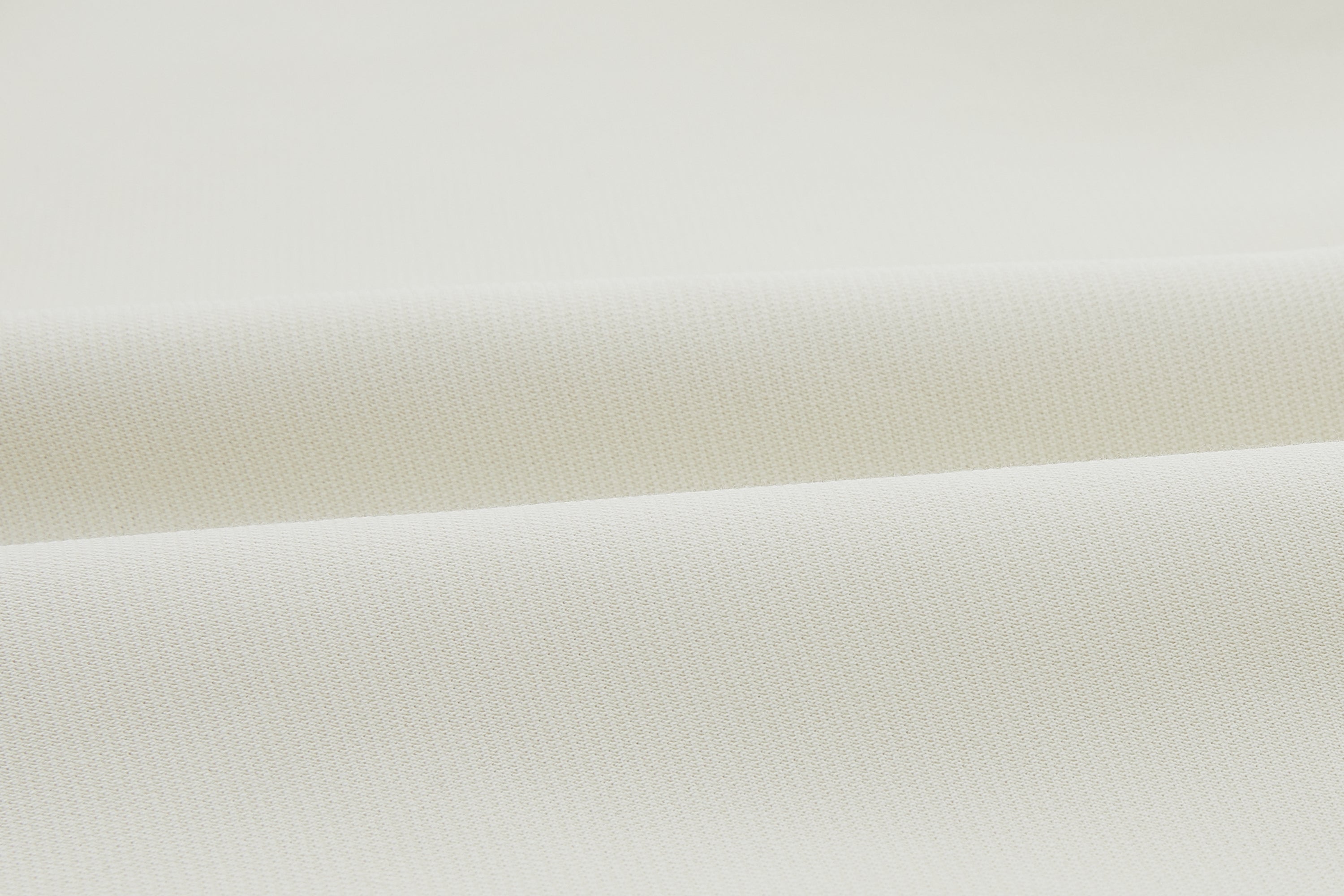 swatch of the white polo shirt