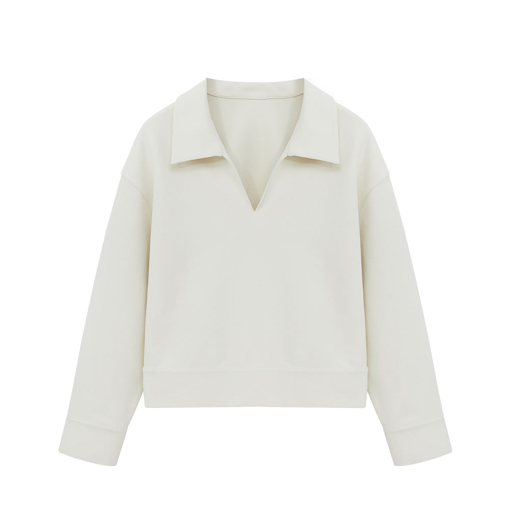 flat lay of the white polo shirt