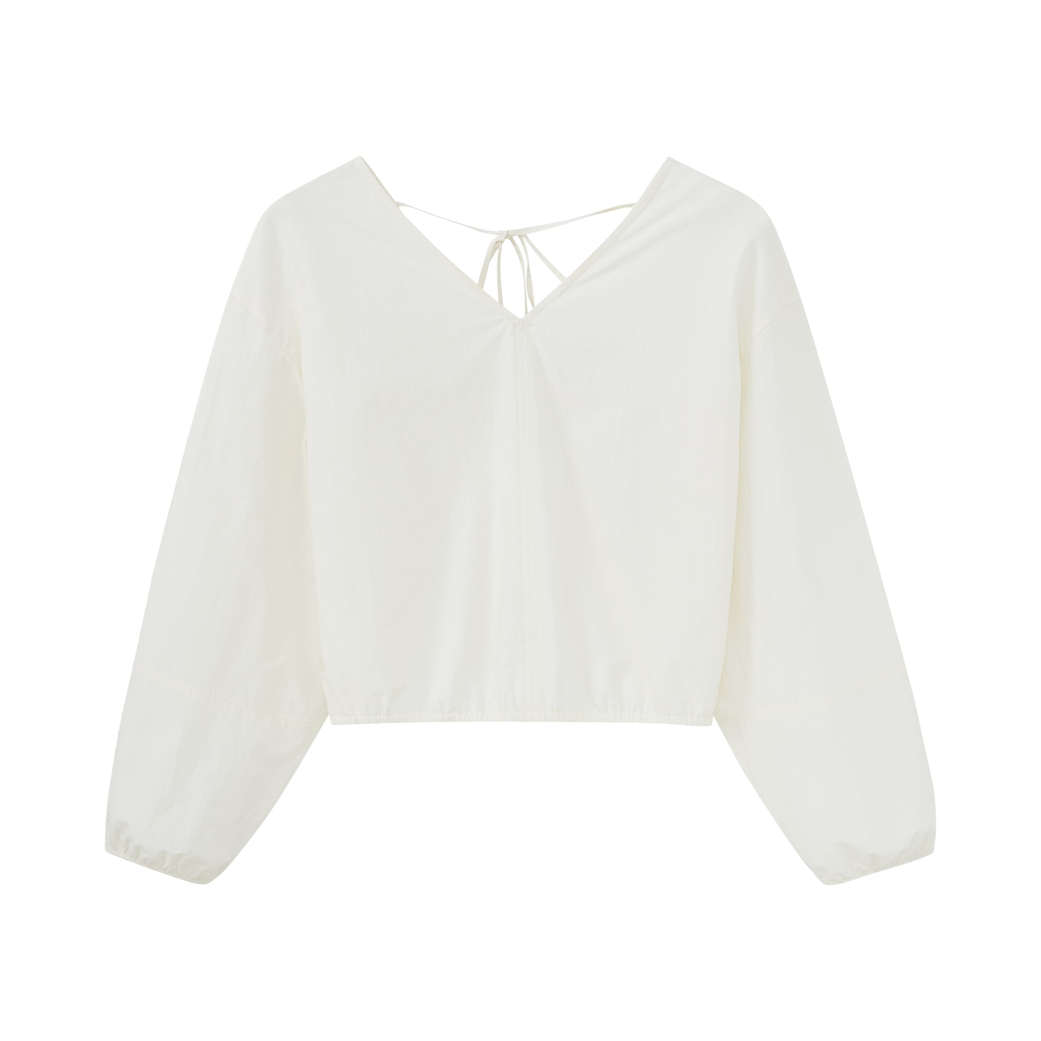 Flat lay of white top.