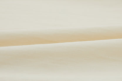 Swatch of ivory top.