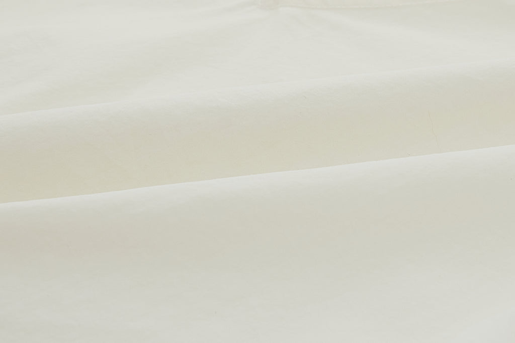 Swatch of white top.