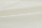 Swatch of white top.