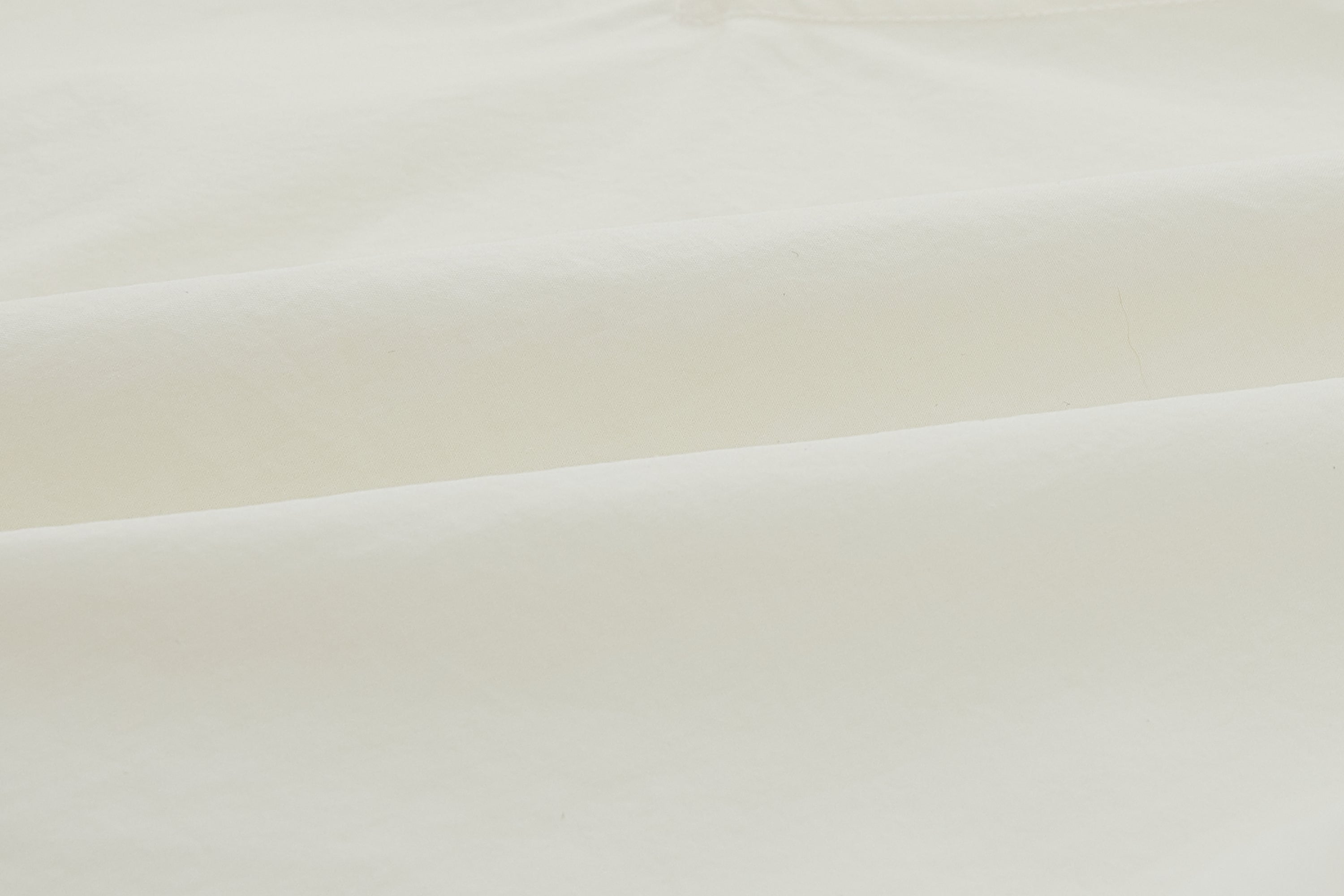 Swatch of white top.