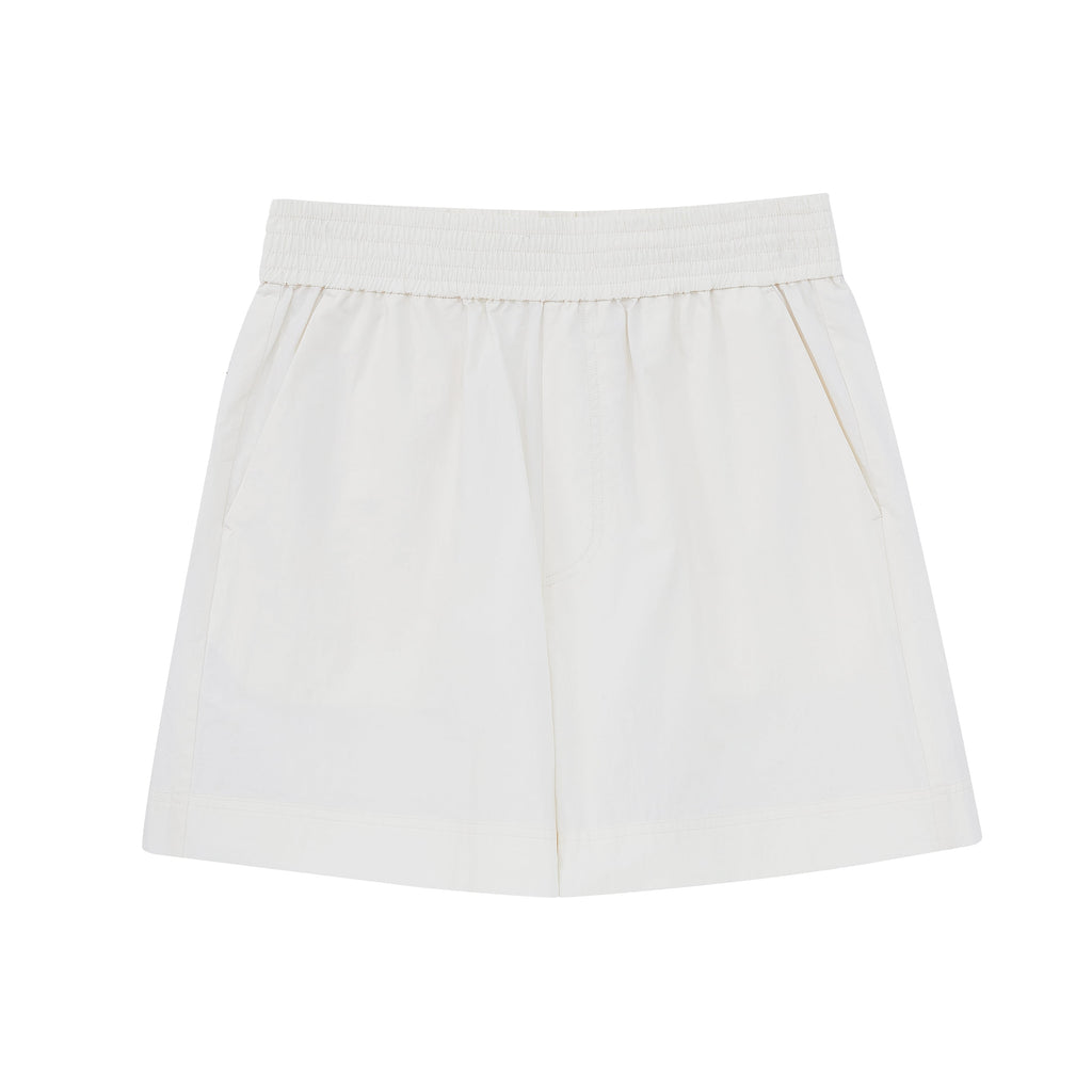 Flat lay of white shorts.