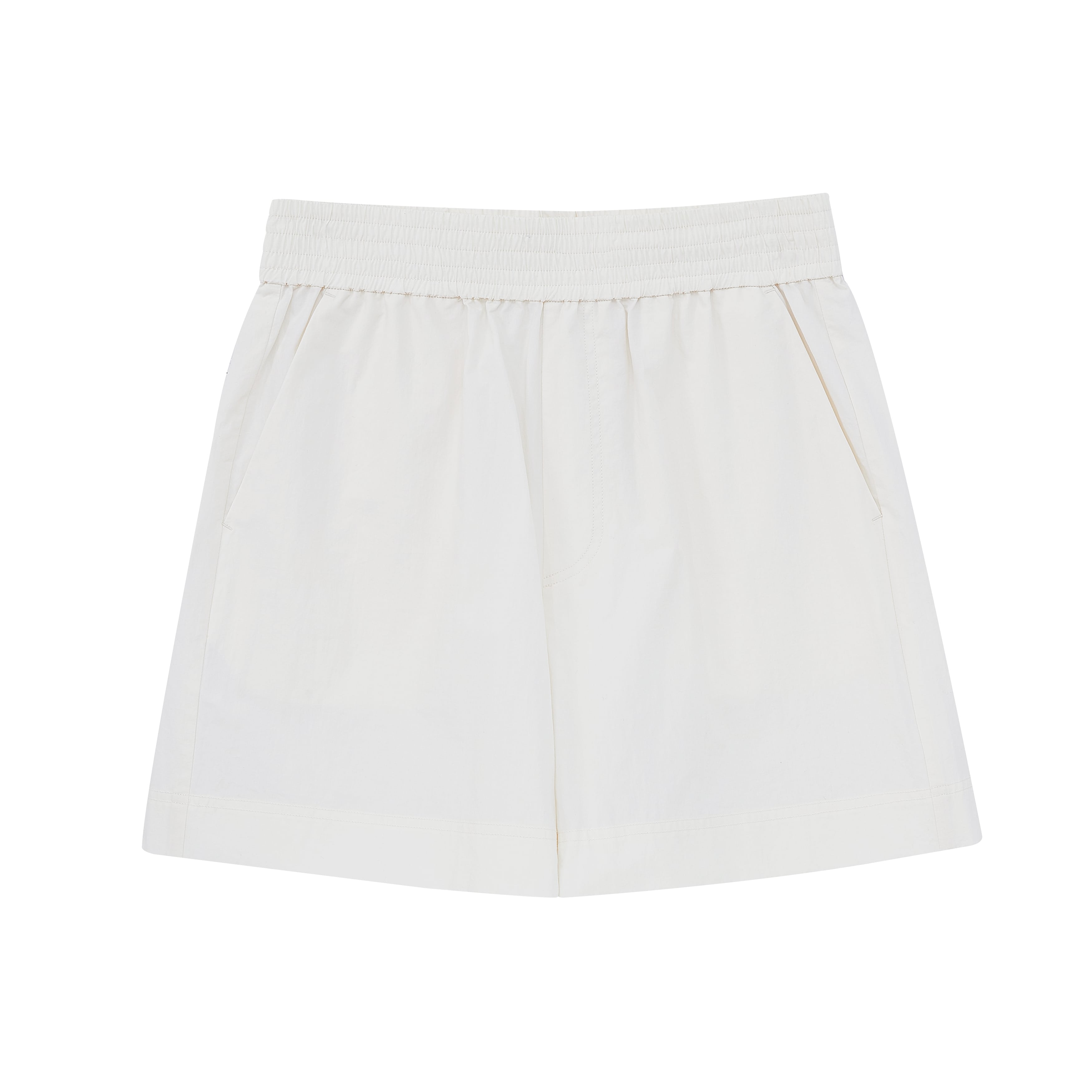 Flat lay of white shorts.