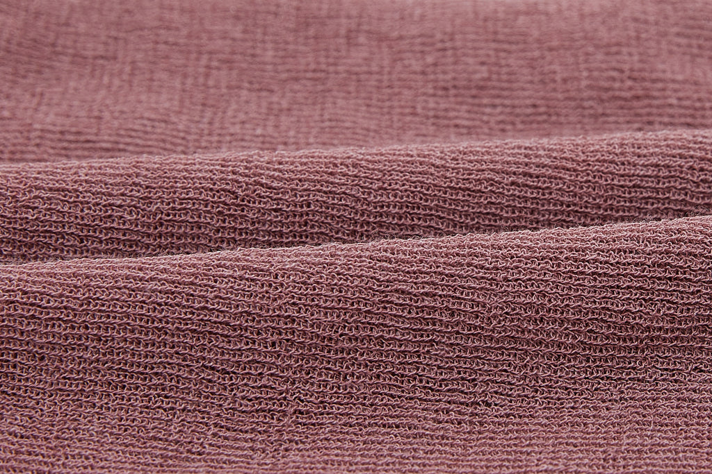 swatch of red knitted fabric
