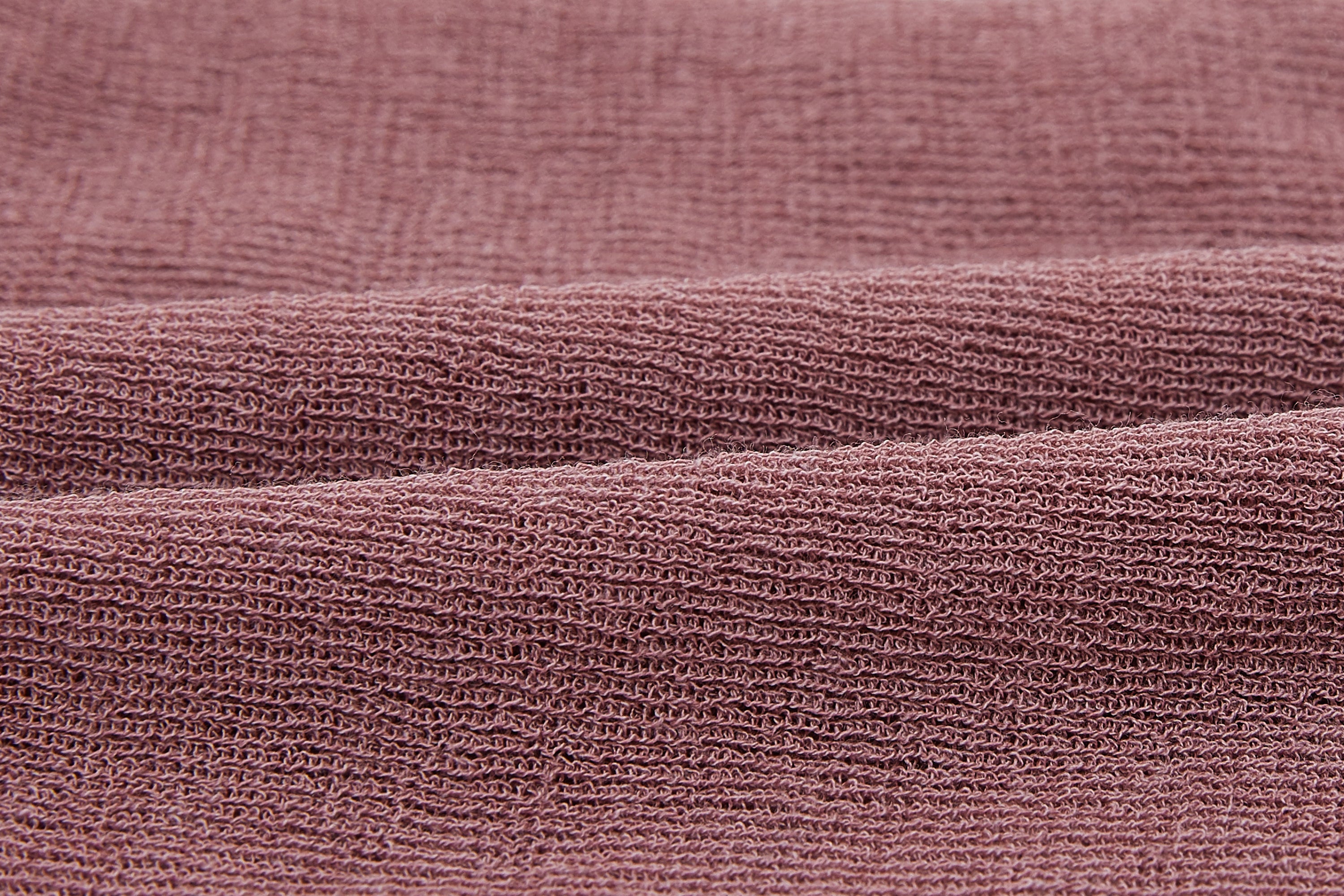 swatch of red knitted fabric