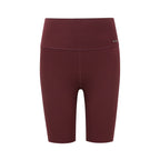 a pair of dark red biker shorts flat lay
