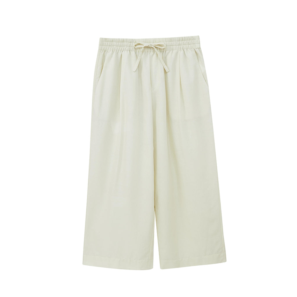 Flat lay of off-white cropped pajama pants