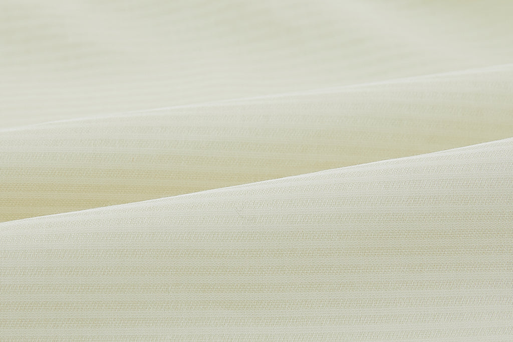 Closeup of off-white fabric