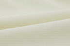 Closeup of off-white fabric