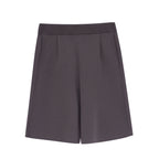 Flat lay of gray knit shorts.