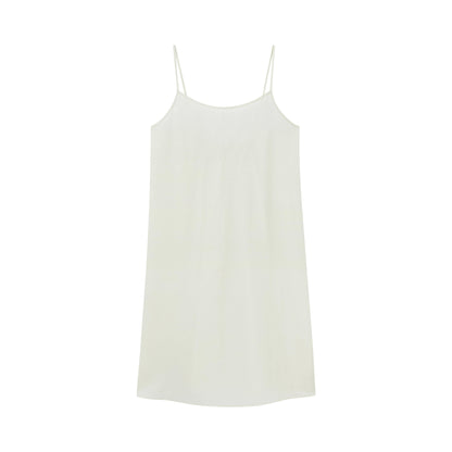 Flat lay of off-white spaghetti strap pajama dress