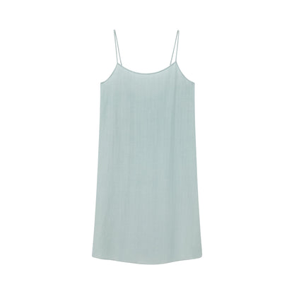Flat lay of seafoam green spaghetti strap pajama dress