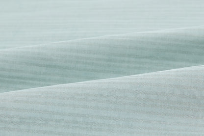 Closeup of seafoam green fabric