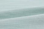 Closeup of seaforam green fabric