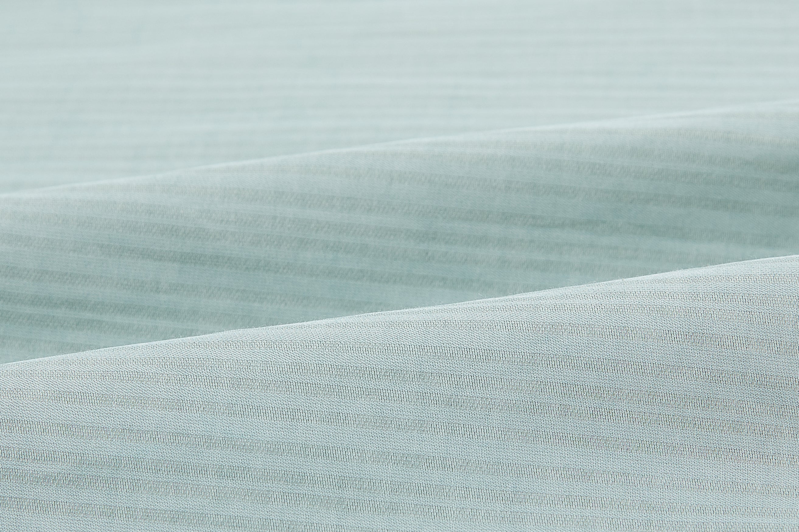 Closeup of seaforam green fabric