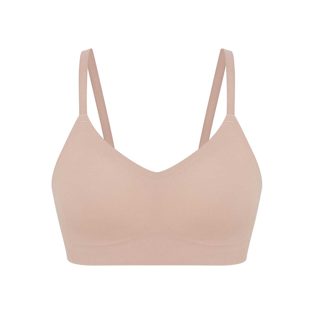 flat lay of light nude bra