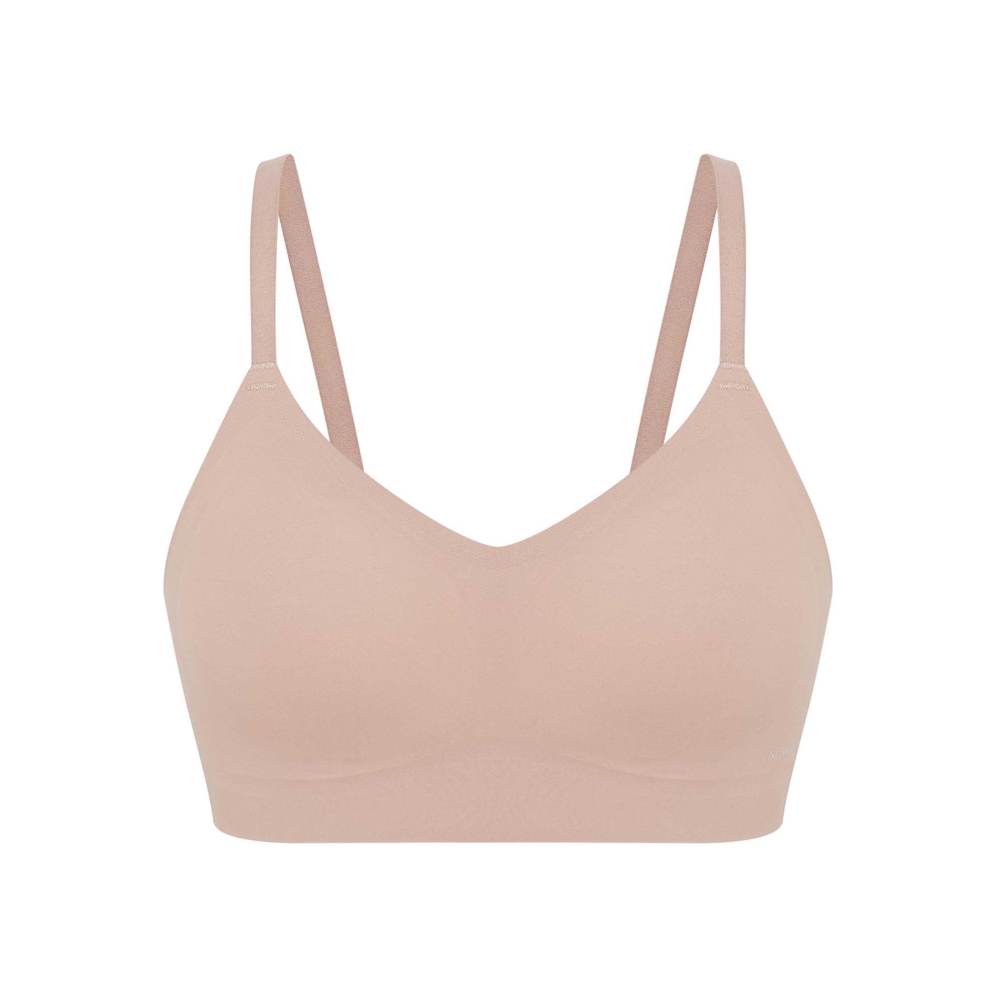 flat lay of light nude bra