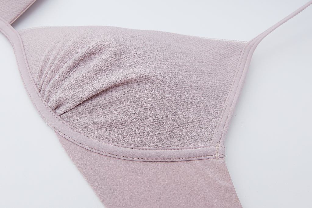 close up view of the flat lay of the light purple bra