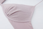 close up view of the flat lay of the light purple bra