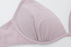 close up view of the flat lay of the light purple bra