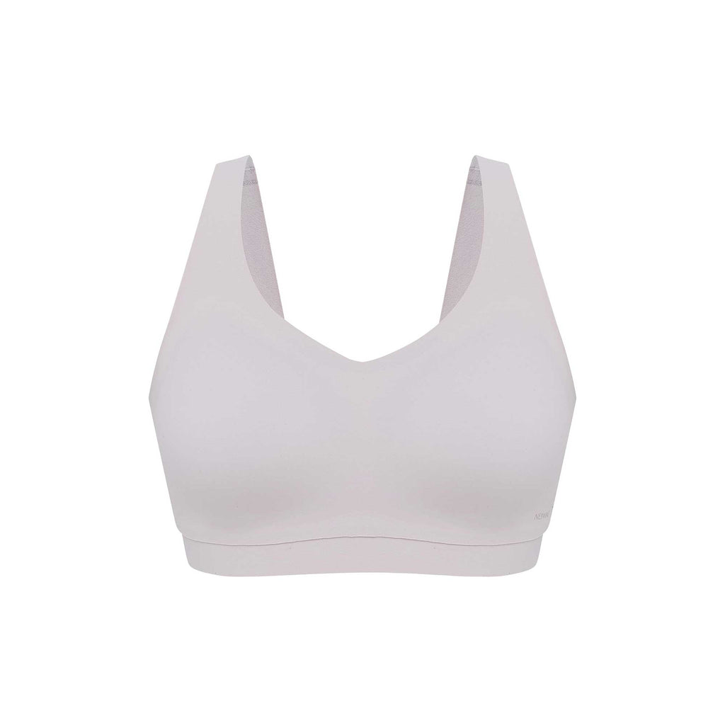 flat lay of an off white bra