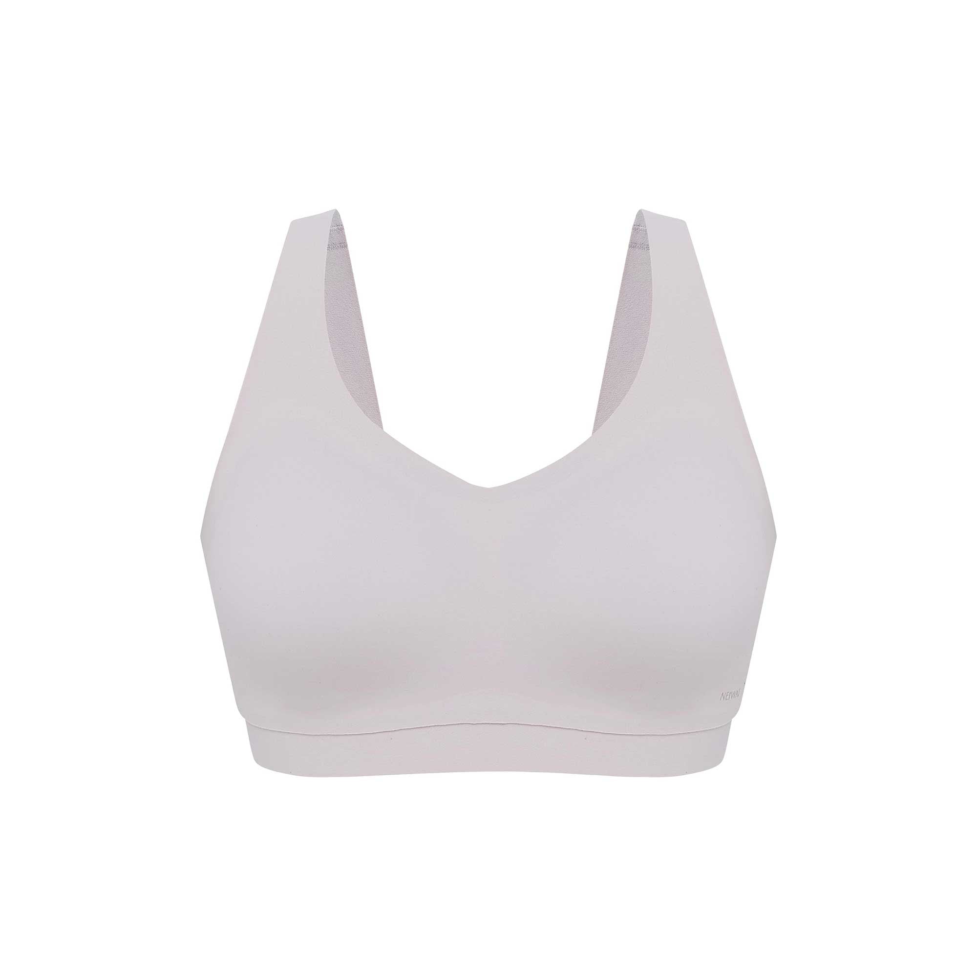 flat lay of an off white bra