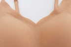 close look of a tan color bra