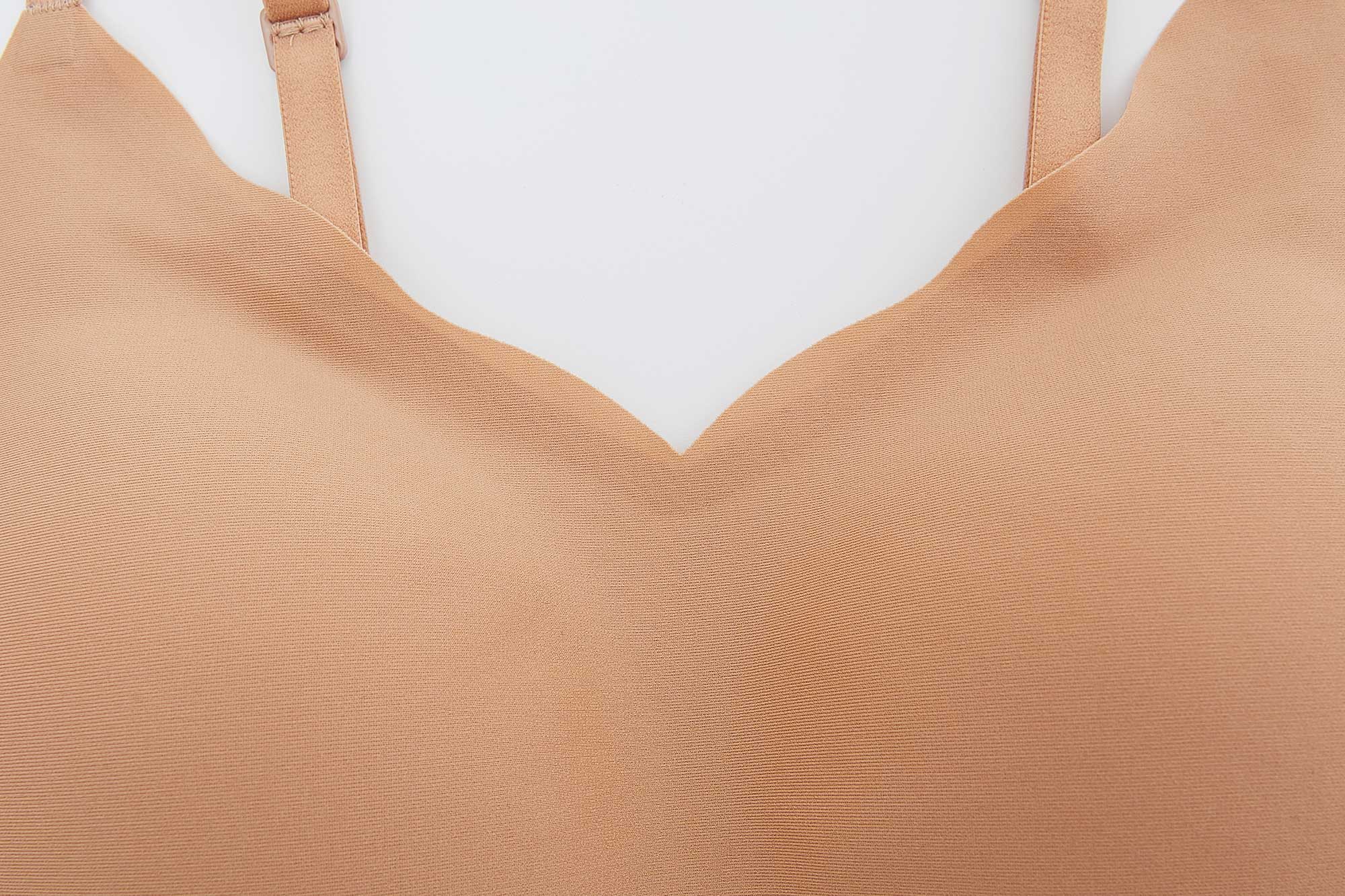 close look of a tan color bra