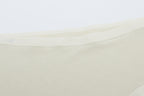 Close-up of off-white lace fabric