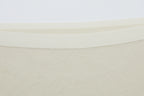 Close-up of off-white lace fabric