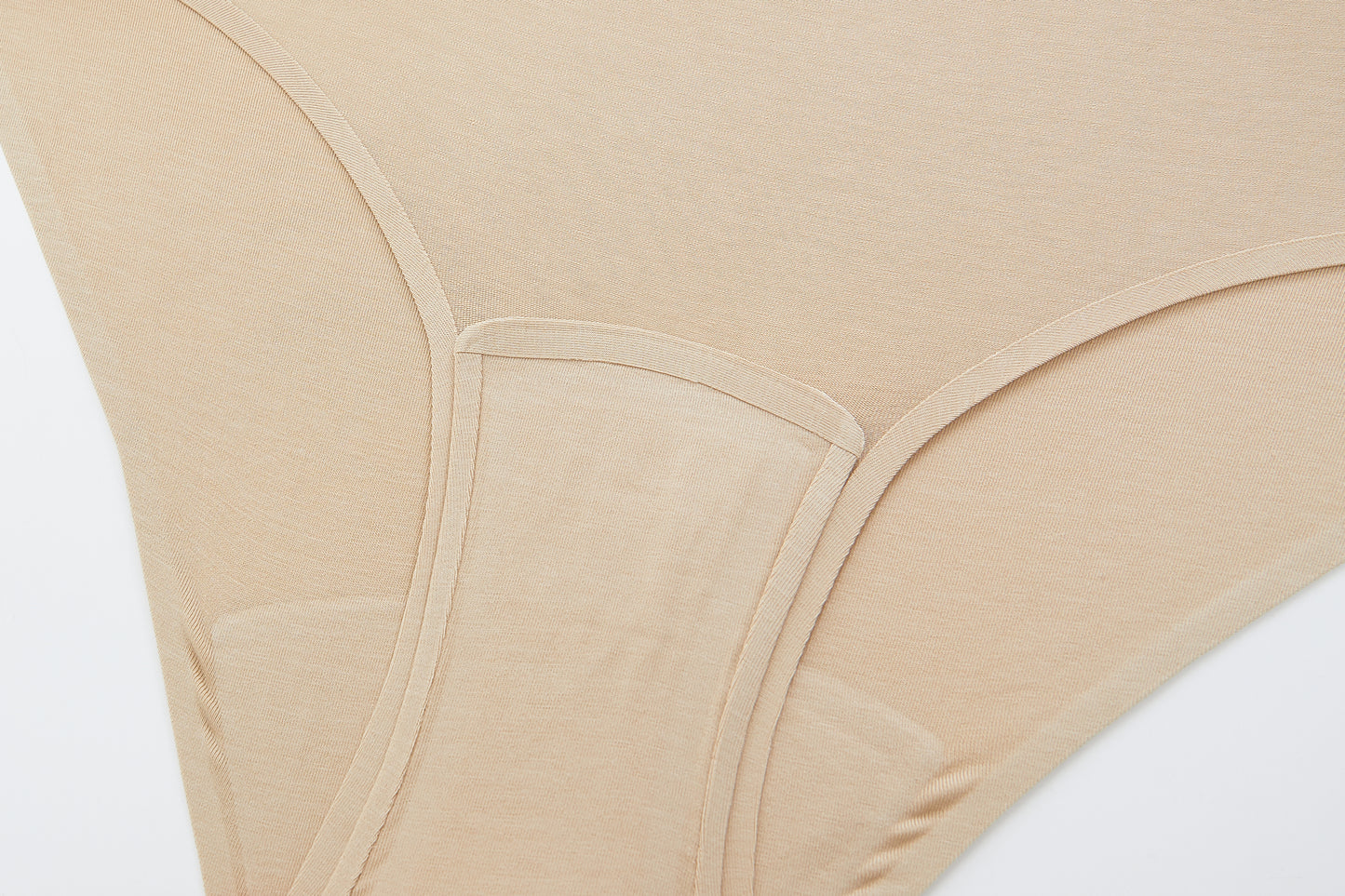 fabric details of the mid waist period brief