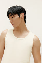 man wearing white tank top