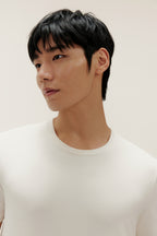 Man wearing white T-shirt. White color.